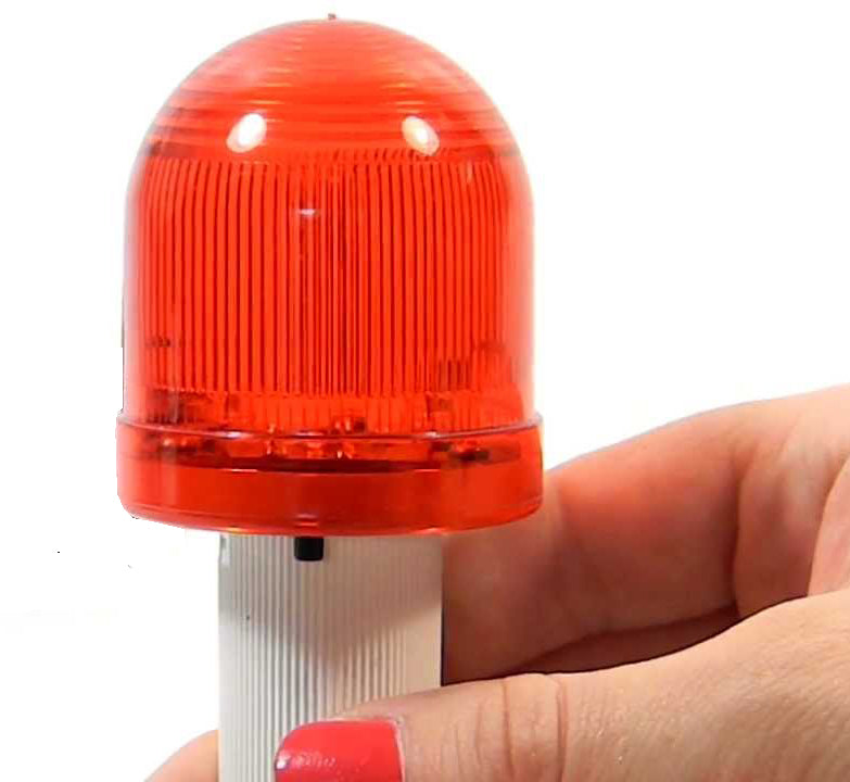 close-up photo of red LED light that can be placed on top of traffic cone for enhanced safety.