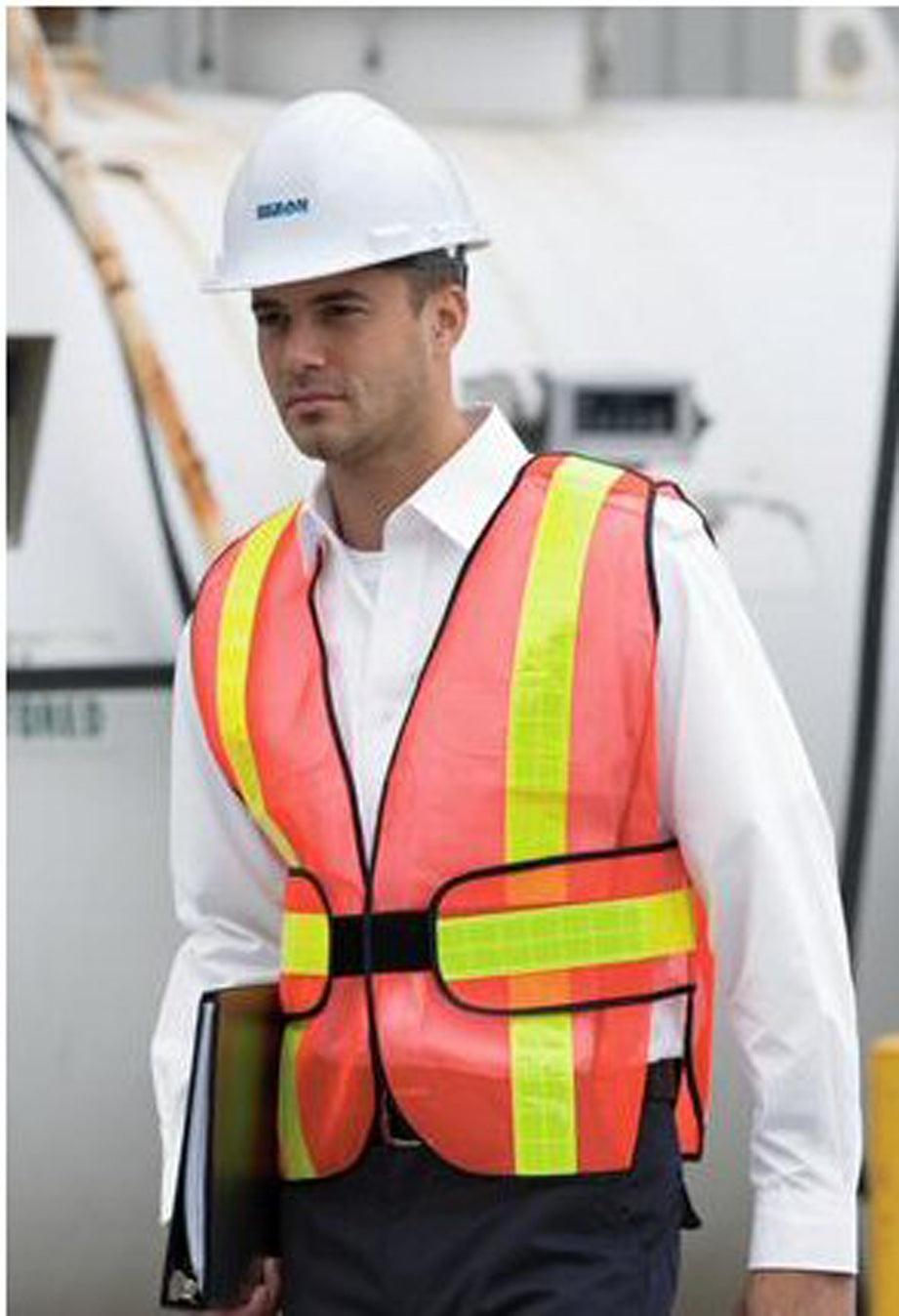 man in hardhat wearing orange and yellow safety vest